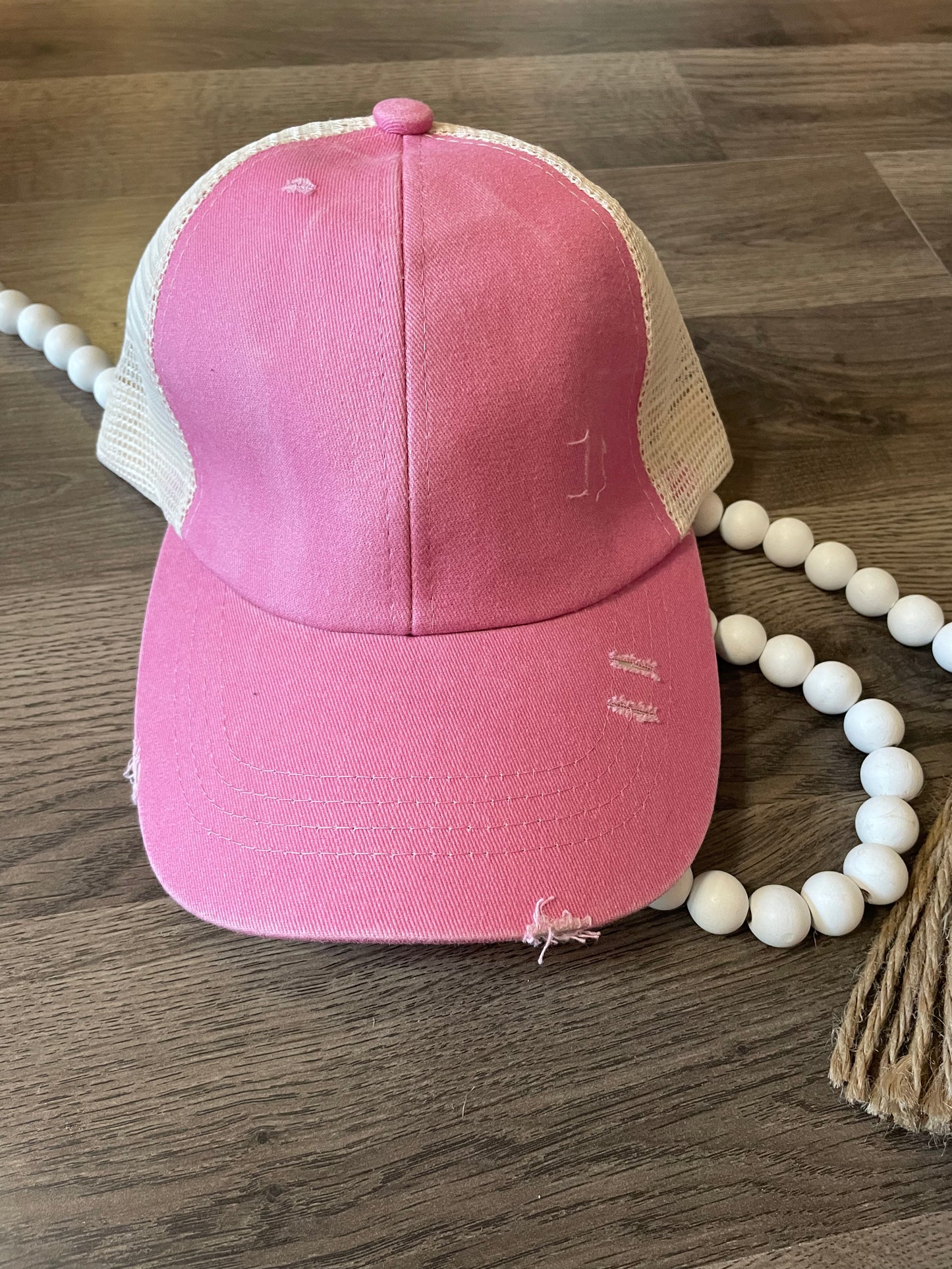 Distressed pink criss cross hat